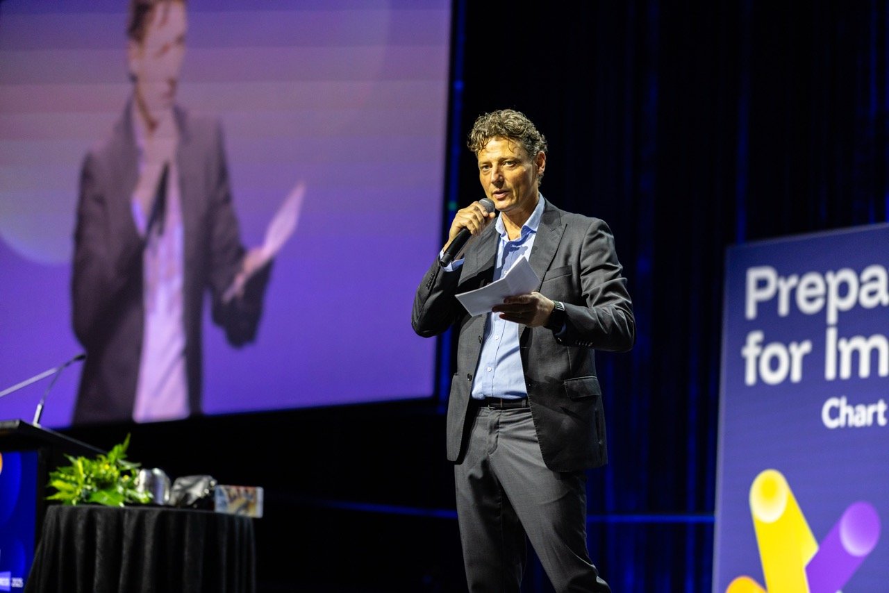 MC presenting on stage at CPA Congress 2025 Gold Coast
